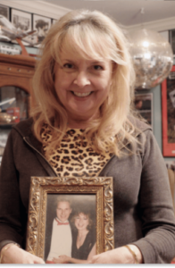 Kelley with a photo of her and her husband Jimmy