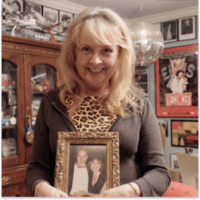 Kelley with a photo of her and her husband Jimmy